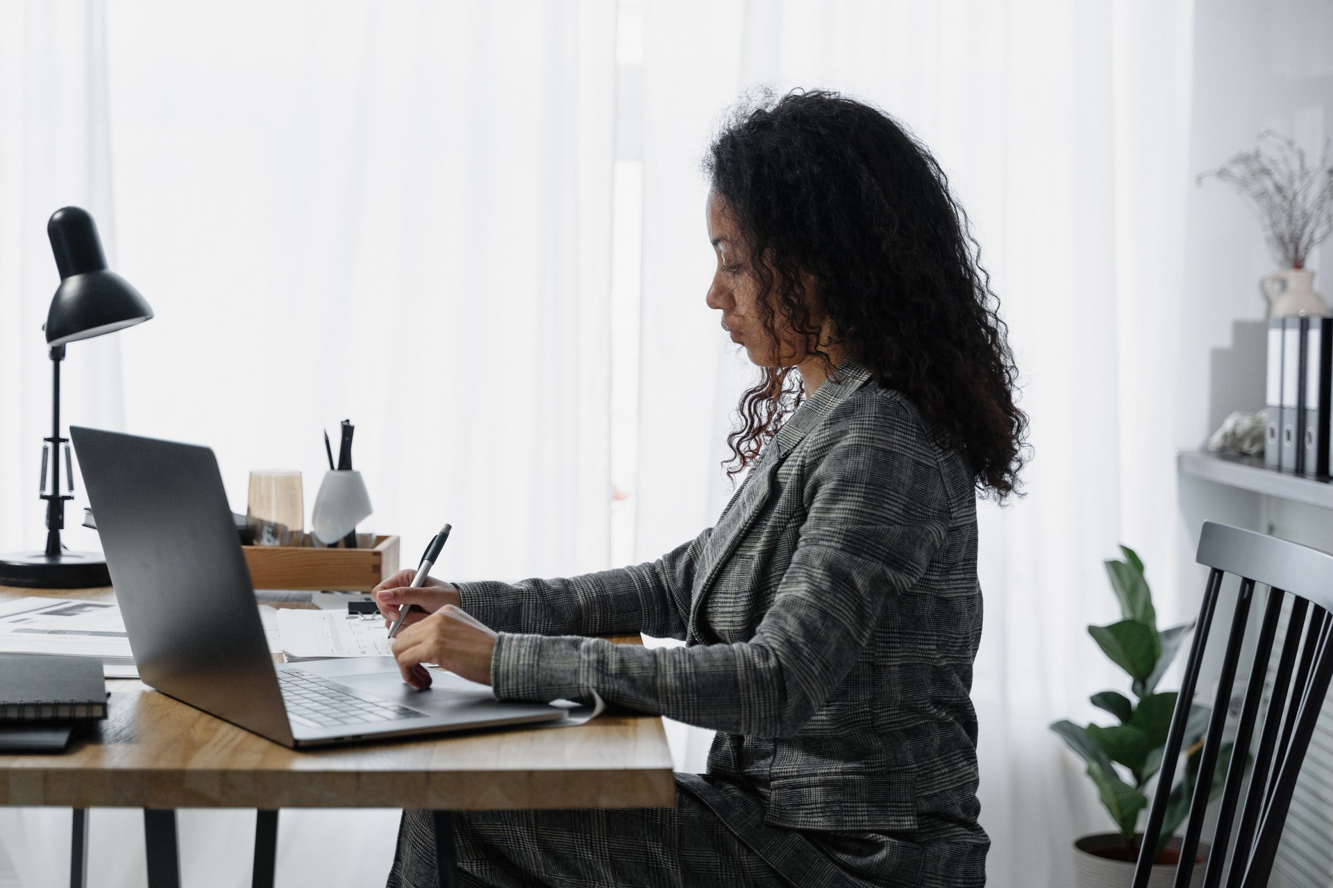 Personal assistant at her desk in the office