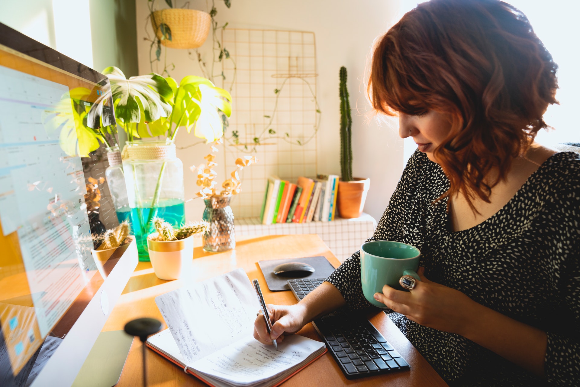 Personal assistant writing in a diary