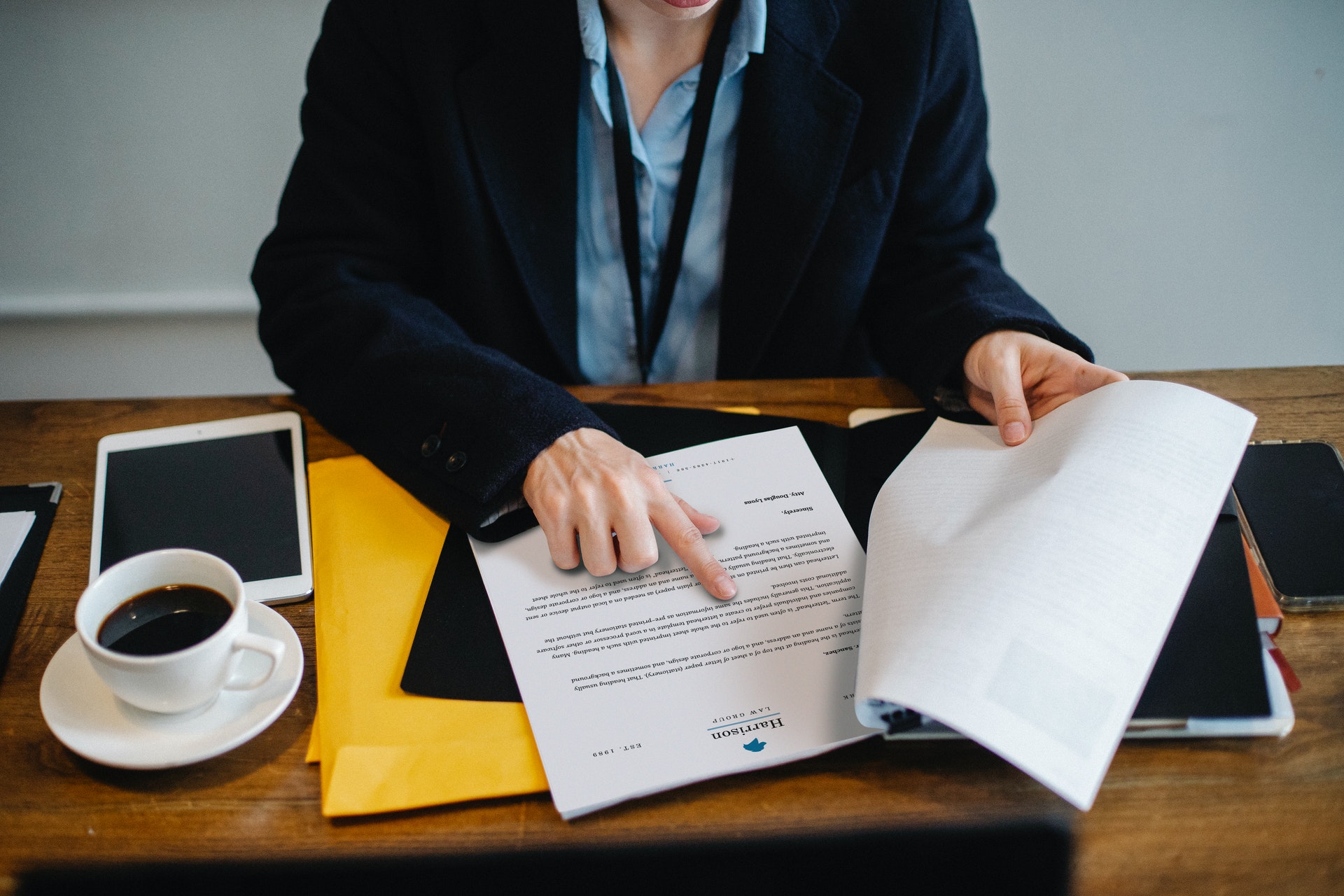 legal secretary reviewing a document