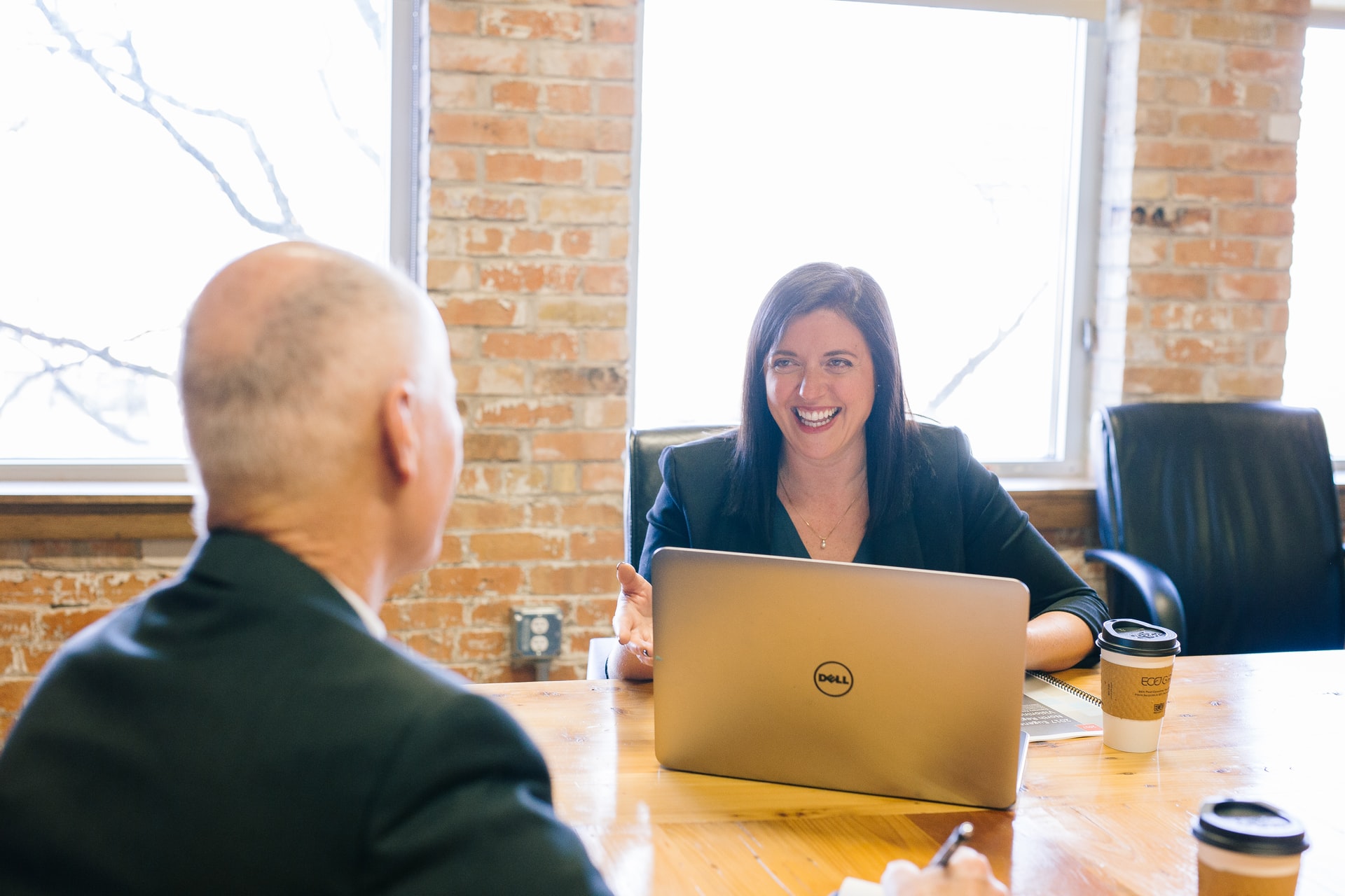 Meeting between temp assistant and boss