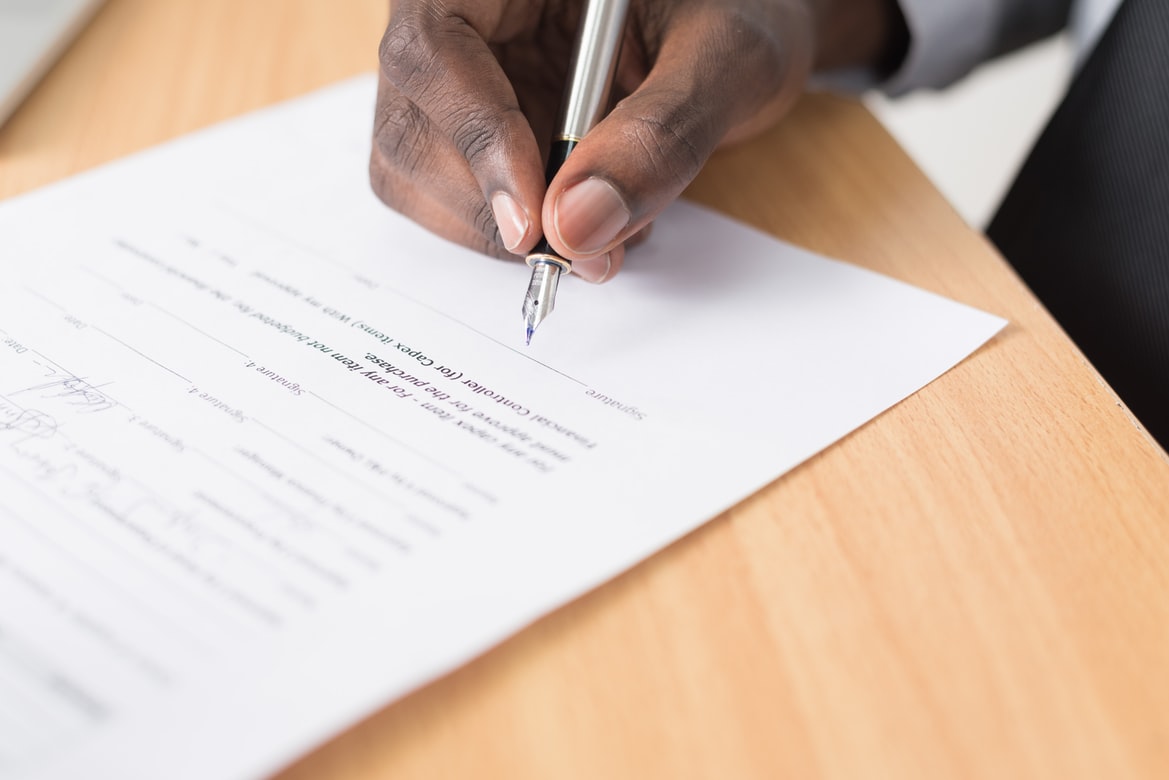work contract being signed