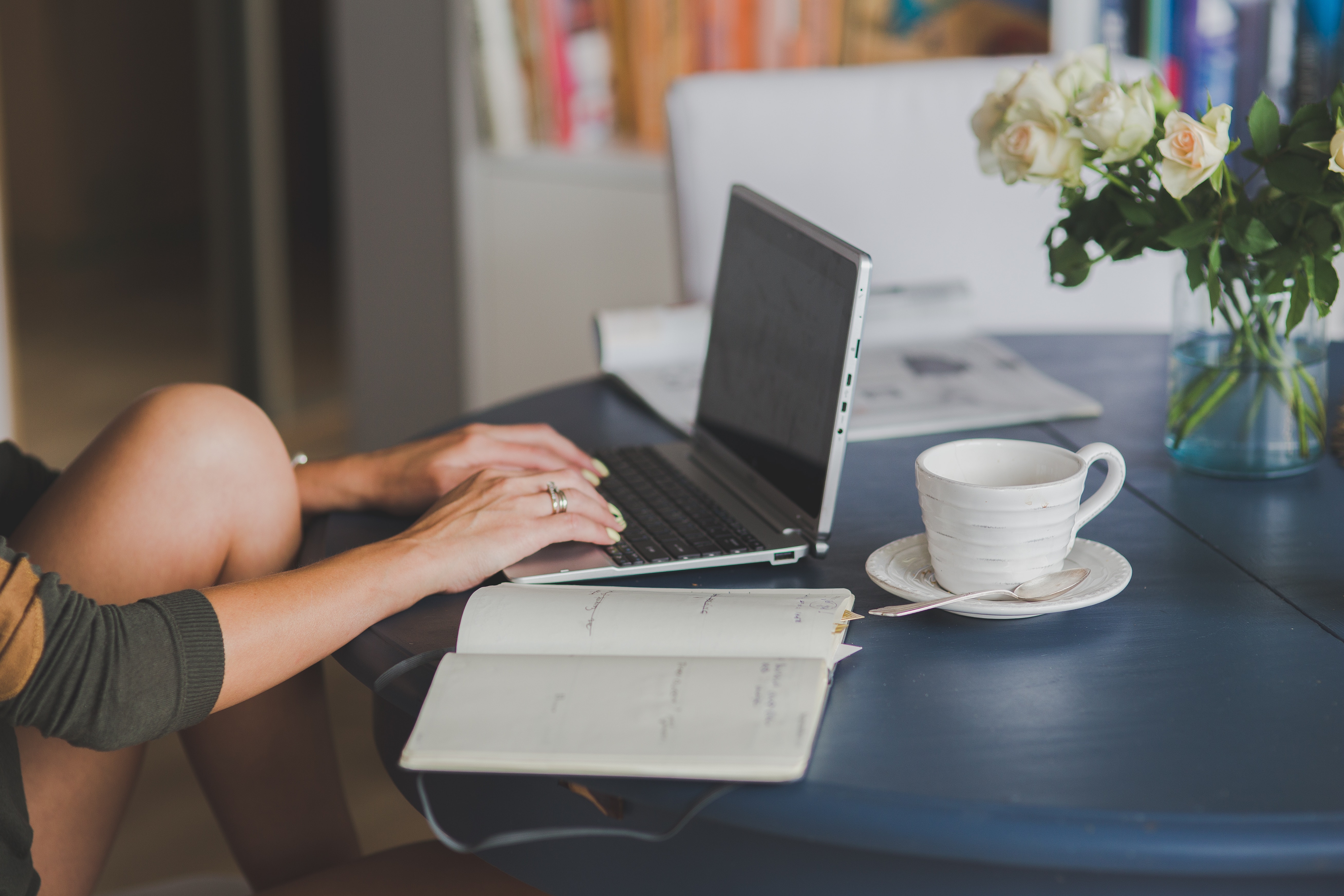 Woman doing admin work on her laptop