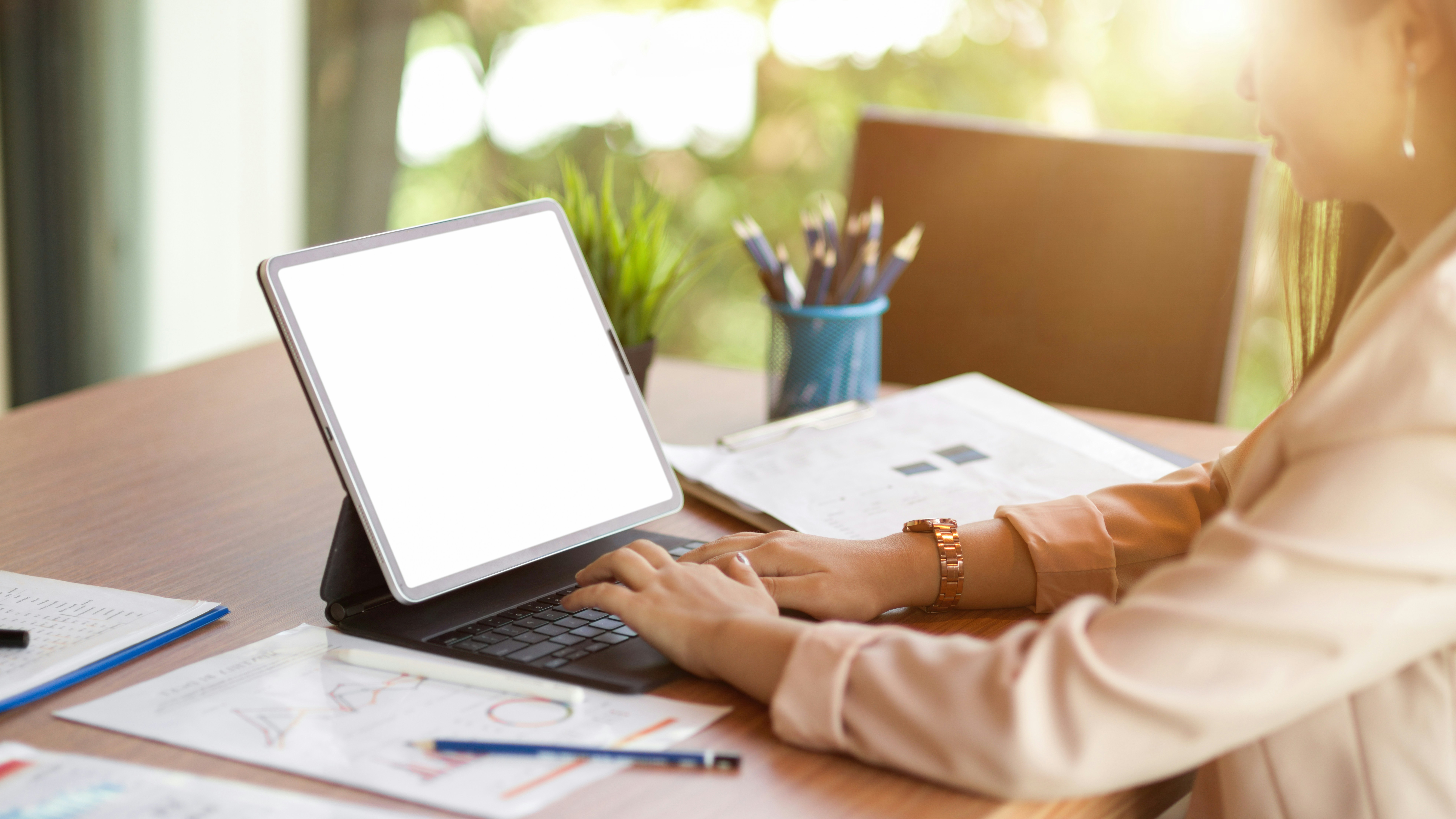 Executive assistant doing office admin in bright office
