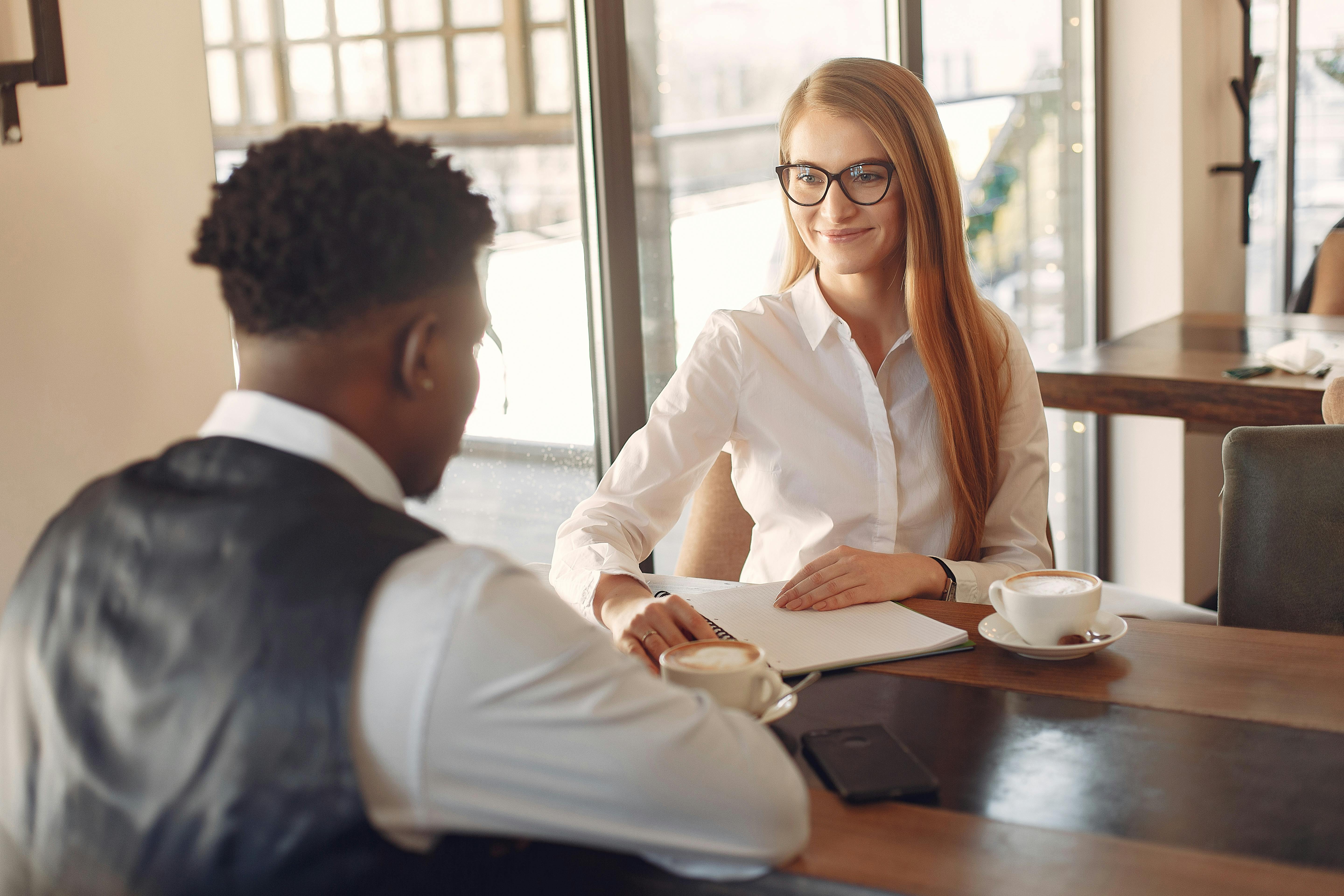 A PA interview featuring two individuals in a bright office.