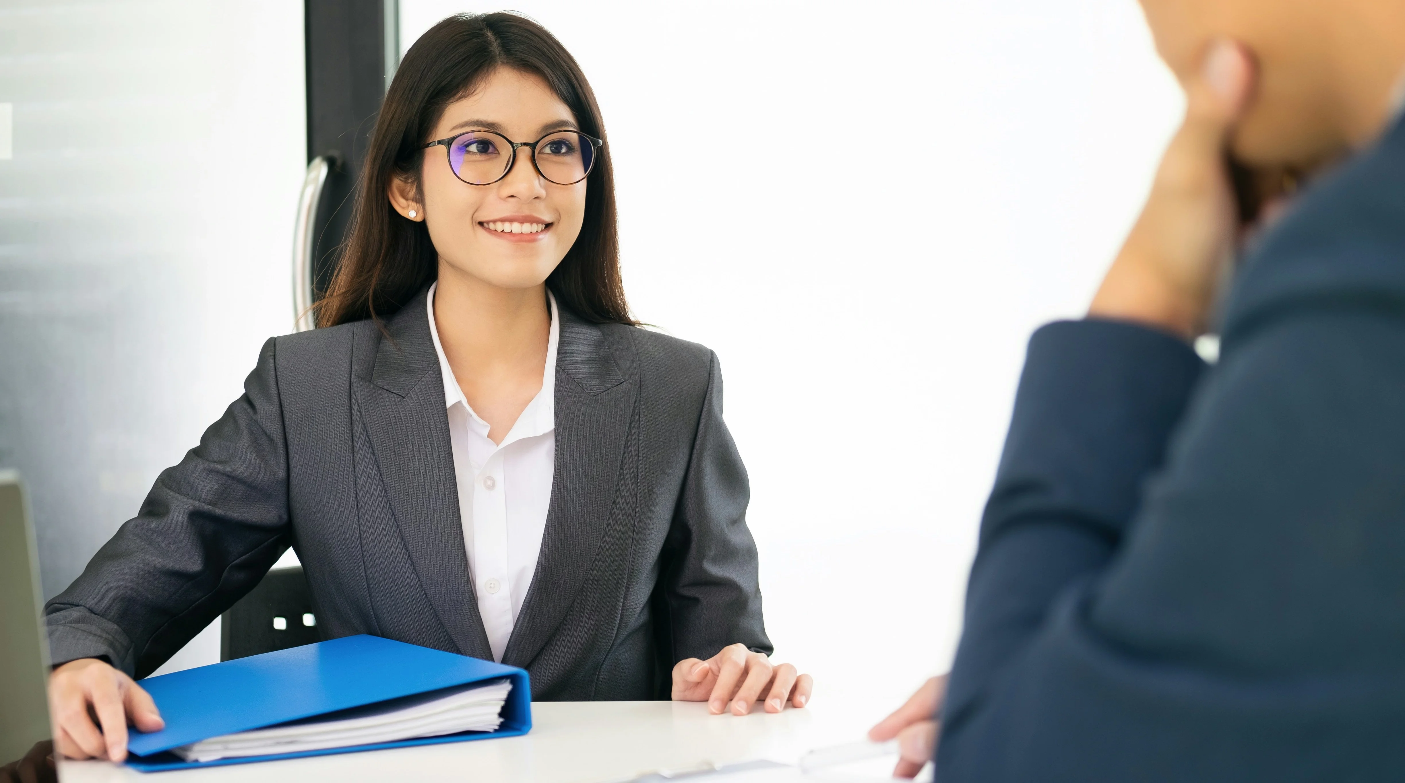 A temp candidate is being interviewed by a temping agency.