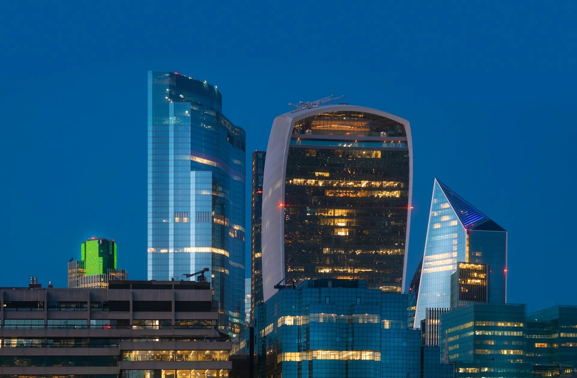 City of London skyscrapers at dusk, including the Walkie-Talkie, in the banking and finance district